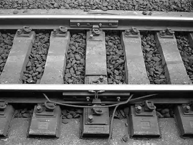 railroad rail end leans to one side