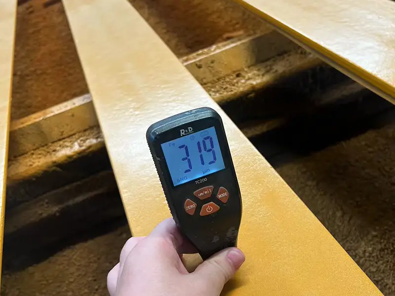 Coating thickness verification on short A65 crane rail section