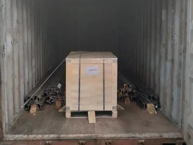 Container loading of bogie wheel assemblies and 30kg rails at Tianjin port for shipment to Onne Nigeria