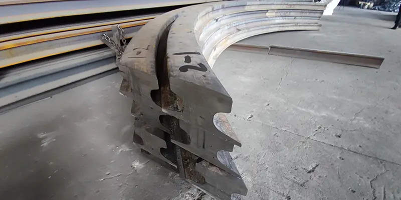 Crane rail with curvature bending