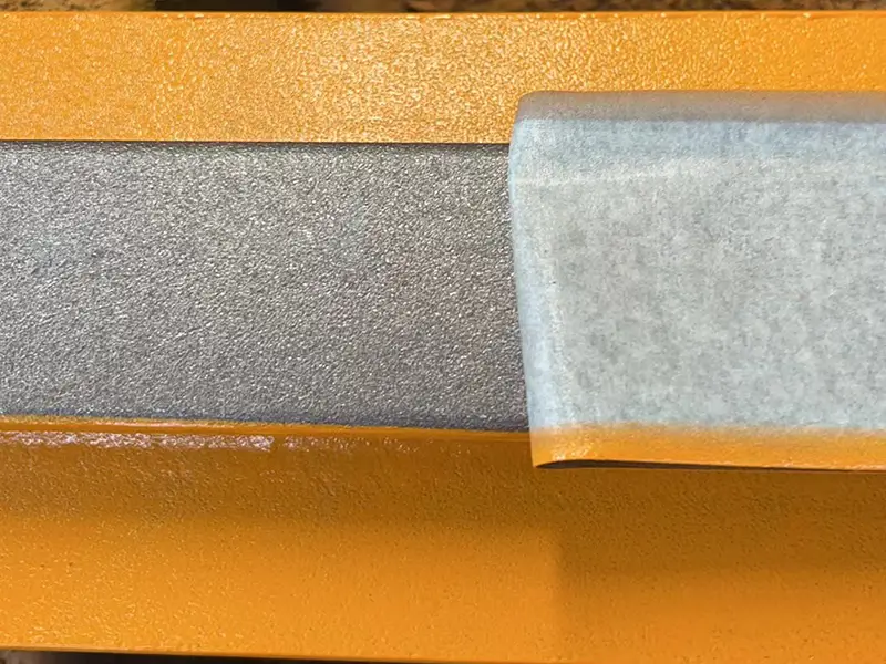 A65 crane rail head protection film ensuring the wheel contact zone stays unpainted