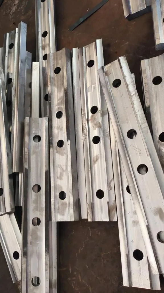 Custom four-hole S49 rail fishplate manufactured to match EN 13674-1 rail profile