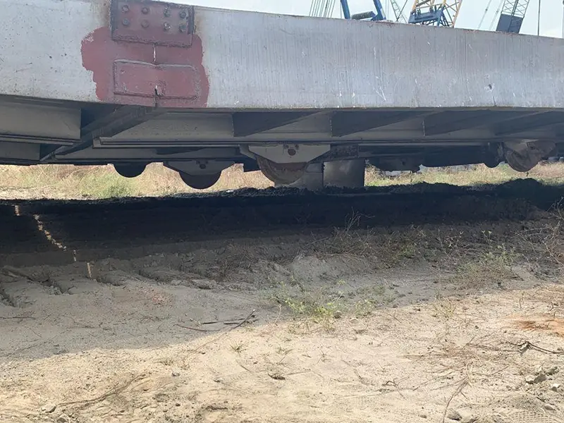 Bogie wheel undercarriage viewed from below showing wheel assemblies and axle connections